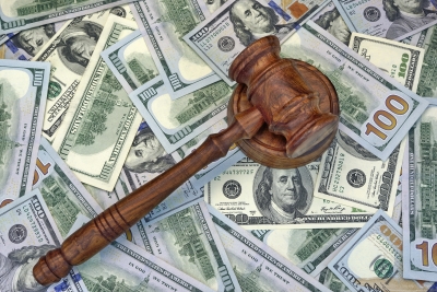 gavel on top of a lot of money, penalties
