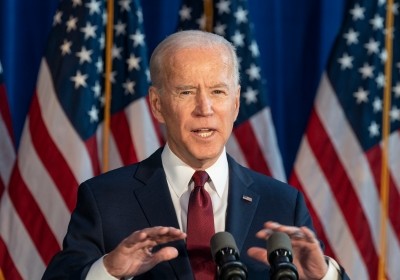 President Biden speaking at podium